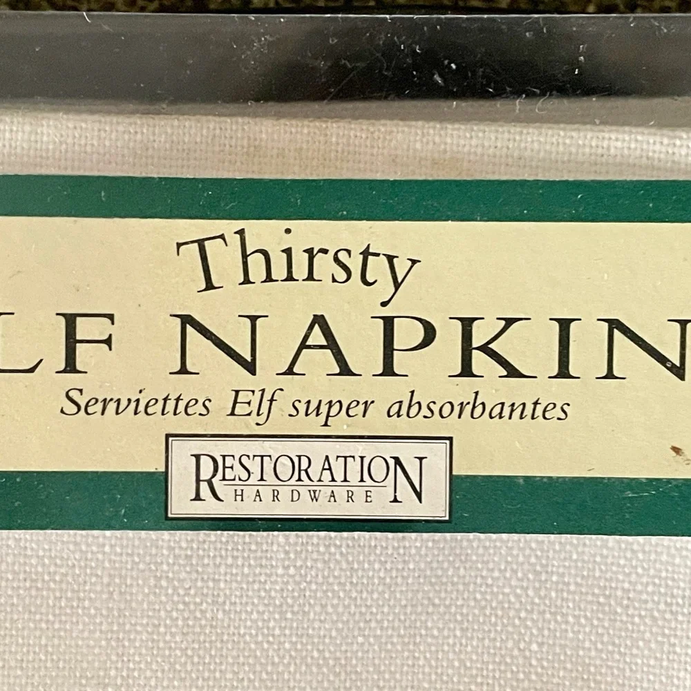 Linen Napkins from RH featuring an embroidered elf